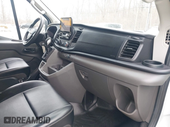 2020 Ford Transit Cargo with VIN 1FTBW3XG0LKB42773, listed as a IAAI auction lot 41564980 with 57,124 mi miles and . Bid and sale history available at carsss.com. Image 5.
