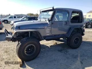 2001 Jeep Wrangler Sport z VIN 1J4FA49S21P328106, wystawiony jako Copart lot #45916735 z przebiegiem 136 073 mil mil oraz Szkoda całkowita • Salvage title. Historia ofert i sprzedaży dostępna na DreamBid. Obrazek 1.