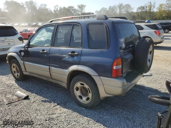 2002 Suzuki Grand Vitara JLX with VIN JS3TD62V424152230, listed as a Copart auction lot 74657294 with 160,135 mi miles and Salvage Title. Bid and sale history available at carsss.com. Image 2.