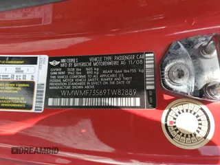 2009 MINI Hardtop S with VIN WMWMF73569TW82889, listed as a Copart auction lot 55630165 with 128,360 mi miles and Clean Title. Bid and sale history available at DreamBid. Image 12.