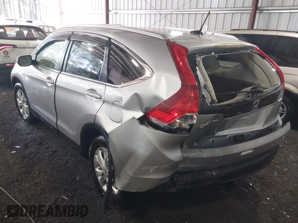 2012 Honda CR-V EX-L with VIN JHLRM4H72CC007574, listed as a IAAI auction lot 41893080 with 164,152 mi miles. Bid and sale history available at carsss.com. Image 3.