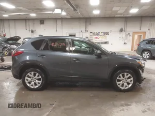 2013 Mazda CX-5 Touring with VIN JM3KE4CE4D0157892, listed as a IAAI auction lot 41684348 with 146,496 mi miles and . Bid and sale history available at DreamBid. Image 14.