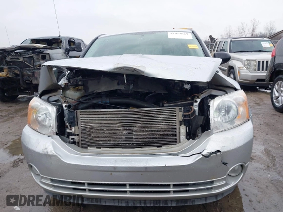 2011 Dodge Caliber Mainstreet with VIN 1B3CB3HA3BD234264, listed as a IAAI auction lot 41998567 with 132,687 mi miles and . Bid and sale history available at DreamBid. Image 13.