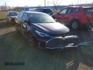 2018 Toyota Avalon XLE with VIN 4T1BK1EB2JU284174, listed as a IAAI auction lot 41555900 with 141,004 mi miles. Bid and sale history available at carsss.com. Image 1.