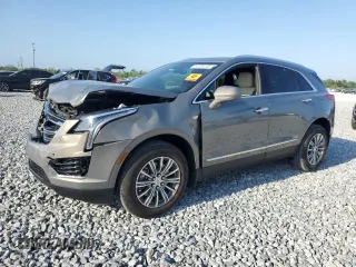2019 Cadillac XT5 Luxury FWD z VIN 1GYKNCRS8KZ263958, wystawiony jako Copart lot #54828265 z przebiegiem 32 944 mil mil oraz Nie do naprawy • Non repairable. Historia ofert i sprzedaży dostępna na DreamBid. Obrazek 1.