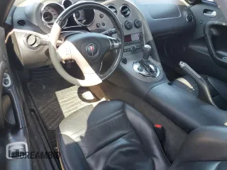 2007 Pontiac Solstice z VIN 1G2MB35B77Y113046, wystawiony jako Copart lot #52297605 z przebiegiem 35 658 mil mil oraz Szkoda całkowita • Salvage title. Historia ofert i sprzedaży dostępna na DreamBid. Obrazek 8.