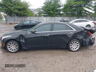 2014 Cadillac CTS AWD z VIN 1G6AW5SX4E0129136, wystawiony jako IAAI lot #42364098 z przebiegiem 137 080 mil mil oraz . Historia ofert i sprzedaży dostępna na DreamBid. Obrazek 14.