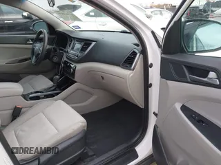 2016 Hyundai Tucson Sport with VIN KM8J33A2XGU242256, listed as a IAAI auction lot 41065573 with 97,503 mi miles. Bid and sale history available at carsss.com. Image 5.