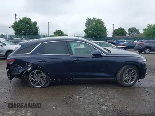 2023 Genesis GV70 2.5T with VIN KMUMADTB7PU130120, listed as a IAAI auction lot 42460466 with 25,802 mi miles and . Bid and sale history available at DreamBid. Image 12.