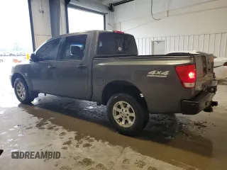 2004 Nissan Titan LE with VIN 1N6AA07B74N507976, listed as a Copart auction lot 56402785 with 181,253 mi miles and Salvage title. Bid and sale history available at DreamBid. Image 2.