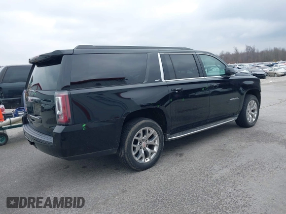 2015 GMC Yukon XL SLT with VIN 1GKS2HKC6FR746809, listed as a IAAI auction lot 41559570 with 144,401 mi miles. Bid and sale history available at carsss.com. Image 4.