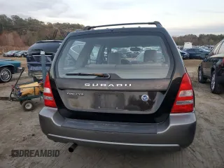 2003 Subaru Forester XS with VIN JF1SG65623H724854, listed as a Copart auction lot 82579774 with 176,986 mi miles and Salvage Title. Bid and sale history available at carsss.com. Image 6.