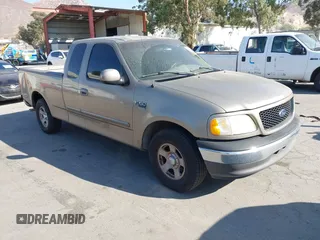 2002 Ford F-150 XL with VIN 1FTRX17WX2NA97846, listed as a IAAI auction lot 42682857 with 185,438 mi miles and . Bid and sale history available at DreamBid. Image 1.
