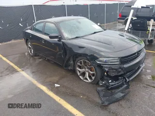 2015 Dodge Charger SXT with VIN 2C3CDXHGXFH845104, listed as a IAAI auction lot 42673601 with 110,830 mi miles and . Bid and sale history available at DreamBid. Image 1.