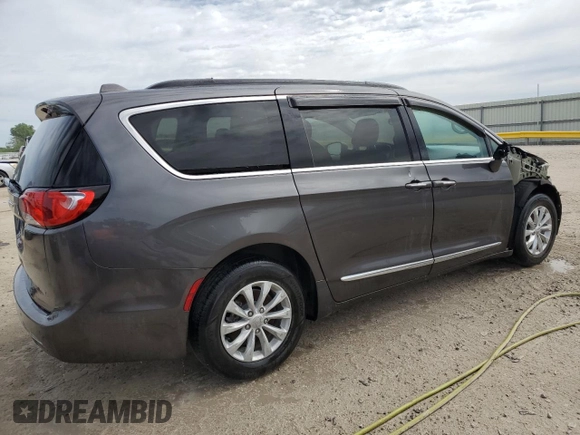 2017 Chrysler Pacifica Touring L with VIN 2C4RC1BG7HR569315, listed as a Copart auction lot 47018605 with 131,519 mi miles and Salvage Title. Bid and sale history available at DreamBid. Image 3.