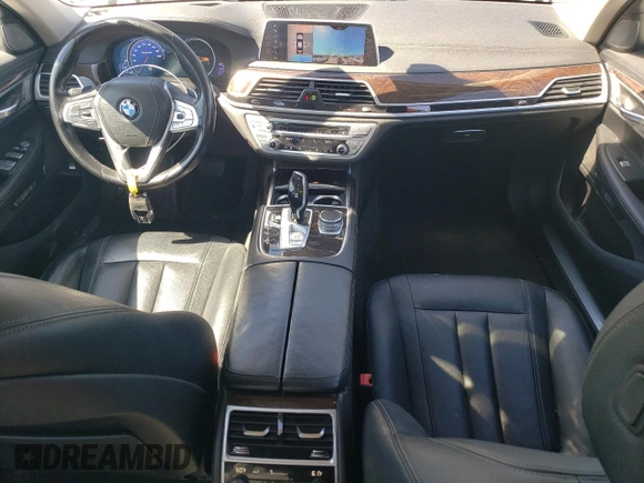 2018 BMW 7 Series 740e xDrive with VIN WBA7J2C55JG938385, listed as a Copart auction lot 49109985 with 81,567 mi miles and Salvage Title. Bid and sale history available at DreamBid. Image 8.