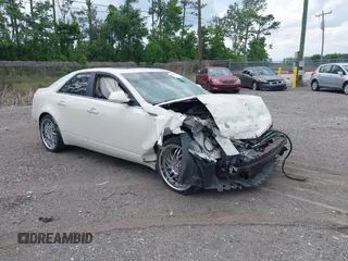 2009 Cadillac CTS RWD z VIN 1G6DF577390175097, wystawiony jako IAAI lot #42359549 z przebiegiem 217 286 mil mil oraz . Historia ofert i sprzedaży dostępna na DreamBid. Obrazek 1.