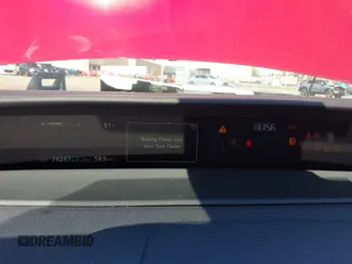 2021 Toyota Prius LE with VIN JTDKAMFP6M3192515, listed as a IAAI auction lot 42302003 with 74,247 mi miles and . Bid and sale history available at DreamBid. Image 7.