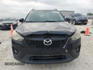 2015 Mazda CX-5 Touring with VIN JM3KE4CYXF0446370, listed as a Copart auction lot 52392575 with 132,419 mi miles and Salvage Title. Bid and sale history available at DreamBid. Image 5.
