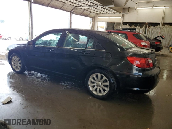 2010 Chrysler Sebring Limited with VIN 1C3CC5FB2AN229671, listed as a Copart auction lot 62181015 with 229,390 mi miles and Salvage title. Bid and sale history available at DreamBid. Image 2.
