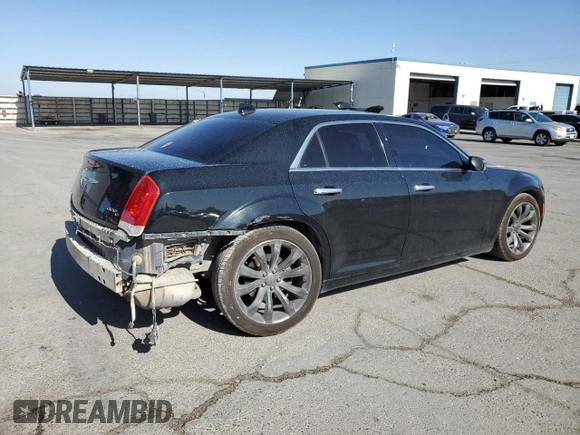 2015 Chrysler 300 C with VIN 2C3CCAET4FH772748, listed as a Copart auction lot 61331724 with 97,856 mi miles and Salvage Title. Bid and sale history available at DreamBid. Image 3.