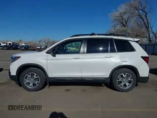 2023 Honda Passport TrailSport with VIN 5FNYF8H60PB015912, listed as a IAAI auction lot 41667749 with 35,019 mi miles and . Bid and sale history available at carsss.com. Image 15.