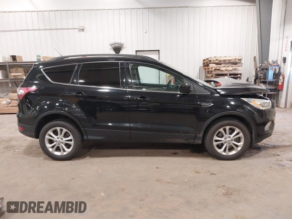 2017 Ford Escape SE with VIN 1FMCU9G98HUD67920, listed as a IAAI auction lot 40937291 with 124,302 mi miles. Bid and sale history available at carsss.com. Image 13.