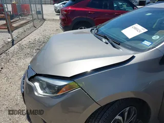 2015 Toyota Corolla L with VIN 5YFBURHE1FP312604, listed as a IAAI auction lot 42085424 with 123,379 mi miles and . Bid and sale history available at DreamBid. Image 19.