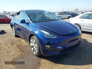 2022 Tesla Model Y Long Range z VIN 7SAYGDEE7NF312239, wystawiony jako IAAI lot #41633712 z przebiegiem Nie podano mil oraz . Historia ofert i sprzedaży dostępna na DreamBid. Obrazek 1.