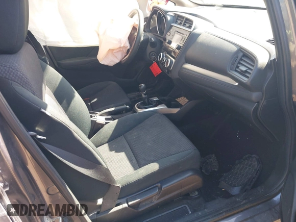2018 Honda Fit LX z VIN 3HGGK5G44JM716592, wystawiony jako IAAI lot #41878820 z przebiegiem 70 464 mil mil oraz . Historia ofert i sprzedaży dostępna na DreamBid. Obrazek 5.