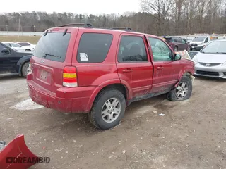 2005 Ford Escape Limited with VIN 1FMYU04155KA77626, listed as a IAAI auction lot 41368626 with 215,182 mi miles. Bid and sale history available at carsss.com. Image 4.