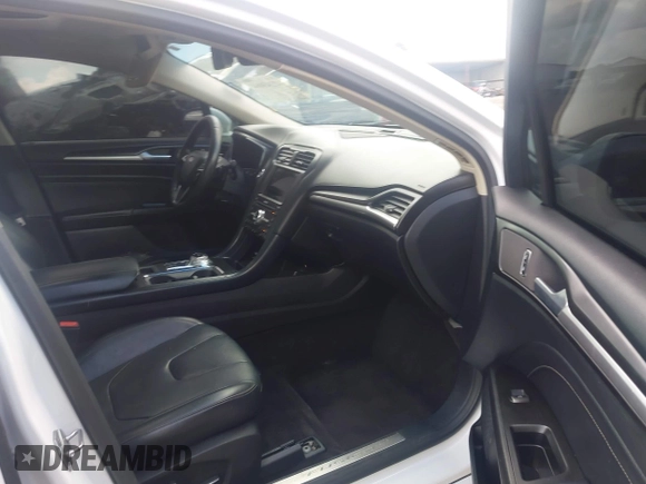 2017 Ford Fusion Titanium z VIN 3FA6P0K93HR203063, wystawiony jako IAAI lot #42243064 z przebiegiem 176 078 mil mil oraz . Historia ofert i sprzedaży dostępna na DreamBid. Obrazek 5.