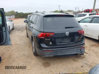 2018 Volkswagen Tiguan S with VIN 3VV0B7AX4JM098495, listed as a IAAI auction lot 41937757 with 179,168 mi miles and . Bid and sale history available at DreamBid. Image 3.
