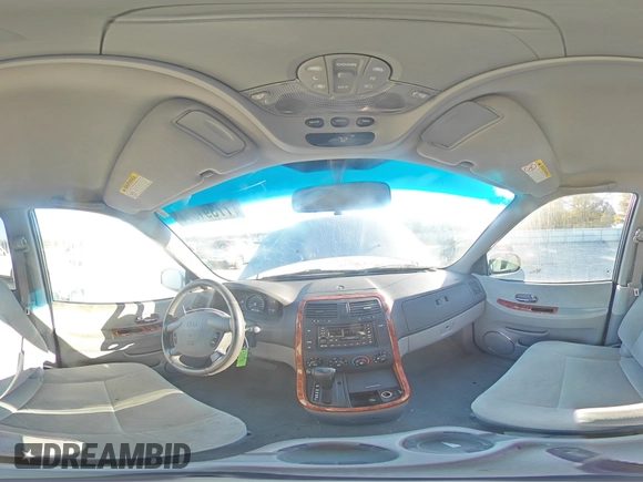 2004 Kia Sedona LX with VIN KNDUP131346508490, listed as a Copart auction lot 77391594 with 41,211 mi miles and Salvage Title. Bid and sale history available at carsss.com. Image 14.