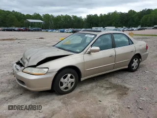 2000 Honda Accord EX z VIN 1HGCG5665YA142367, wystawiony jako Copart lot #56630985 z przebiegiem 227 816 mil mil oraz Szkoda całkowita • Salvage title. Historia ofert i sprzedaży dostępna na DreamBid. Obrazek 1.