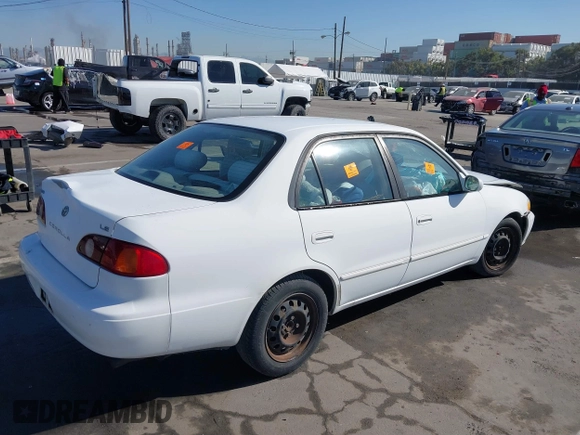 2002 Toyota Corolla CE with VIN 2T1BR12EX2C523872, listed as a IAAI auction lot 41831610 with Not provided miles and . Bid and sale history available at DreamBid. Image 4.