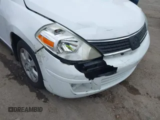2008 Nissan Versa 1.8 S with VIN 3N1BC13E18L354964, listed as a IAAI auction lot 41581663 with 134,321 mi miles. Bid and sale history available at carsss.com. Image 6.