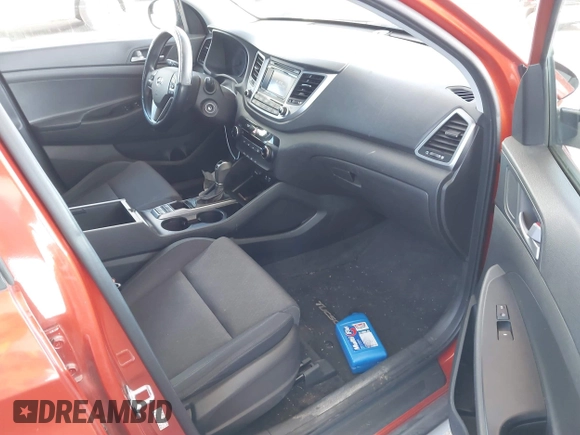 2017 Hyundai Tucson SE with VIN KM8J23A48HU357394, listed as a IAAI auction lot 41841968 with 74,769 mi miles. Bid and sale history available at carsss.com. Image 5.