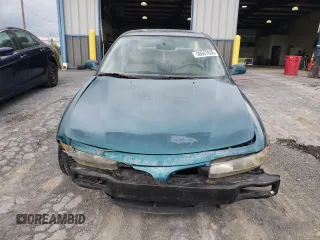 1997 Mitsubishi Galant ES z VIN 4A3AJ56G5VE019296, wystawiony jako Copart lot #56047635 z przebiegiem 87 533 mil mil oraz Szkoda całkowita • Salvage title. Historia ofert i sprzedaży dostępna na DreamBid. Obrazek 5.