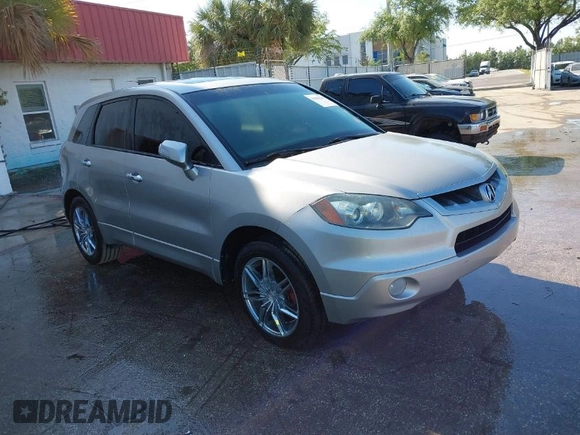 2009 Acura RDX with VIN 5J8TB18249A003575, listed as a IAAI auction lot 41830280 with 229,932 mi miles and . Bid and sale history available at carsss.com. Image 1.