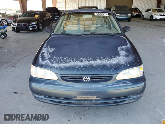 1999 Toyota Corolla VE z VIN 1NXBR12E6XZ286383, wystawiony jako Copart lot #64007215 z przebiegiem 176 069 mil mil oraz Czysty tytuł • Clean title. Historia ofert i sprzedaży dostępna na DreamBid. Obrazek 5.