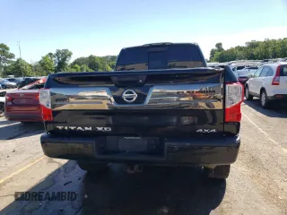 2016 Nissan Titan Pro-4X с VIN 1N6BA1F48GN500861, выставлен на аукционе Copart как лот 46651195 с пробегом 235 134 миль миль и Списание • Salvage title. История ставок и продаж доступна на DreamBid. Изображение 6.