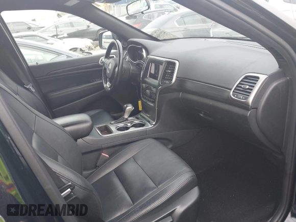 2020 Jeep Grand Cherokee Altitude with VIN 1C4RJEAG4LC337660, listed as a IAAI auction lot 42119646 with 92,780 mi miles and . Bid and sale history available at DreamBid. Image 5.