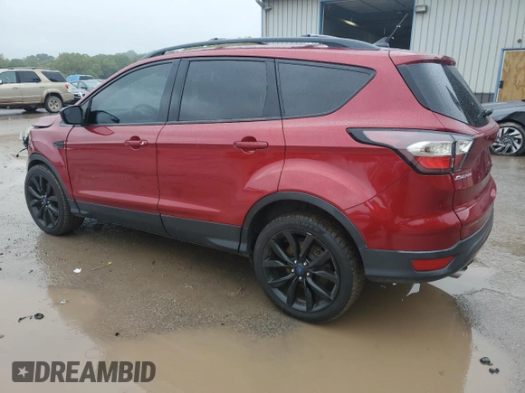 2018 Ford Escape SE z VIN 1FMCU9GD4JUA49819, wystawiony jako Copart lot #73023734 z przebiegiem 96 228 mil mil oraz Szkody całkowita. Historia ofert i sprzedaży dostępna na DreamBid. Obrazek 2.