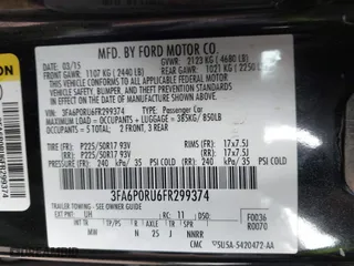 2015 Ford Fusion Titanium Hybrid with VIN 3FA6P0RU6FR299374, listed as a IAAI auction lot 41576007 with 191,285 mi miles. Bid and sale history available at carsss.com. Image 9.