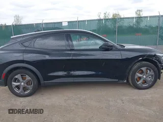 2021 Ford Mustang Mach-E Select with VIN 3FMTK1SS4MMA21329, listed as a IAAI auction lot 42241810 with 35,700 mi miles and . Bid and sale history available at DreamBid. Image 14.