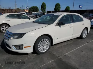 2012 Ford Fusion Hybrid с VIN 3FADP0L38CR171141, выставлен на аукционе Copart как лот 61492425 с пробегом 275 312 миль миль и Чистый • Clean title. История ставок и продаж доступна на DreamBid. Изображение 1.
