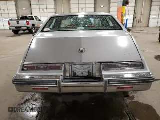 1980 Cadillac Seville z VIN 6S69NAE688845, wystawiony jako Copart lot #78749194 z przebiegiem 66 974 mil mil oraz Tytuł czysty. Historia ofert i sprzedaży dostępna na DreamBid. Obrazek 6.