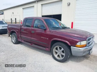 2001 Dodge Dakota Sport with VIN 1B7HL2AN91S278613, listed as a IAAI auction lot 42047239 with 178,321 mi miles. Bid and sale history available at carsss.com. Image 1.