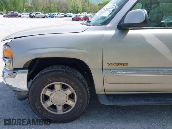 2005 GMC Yukon SLT z VIN 1GKEK13T35R127330, wystawiony jako IAAI lot #42138030 z przebiegiem 195 079 mil mil oraz . Historia ofert i sprzedaży dostępna na DreamBid. Obrazek 15.